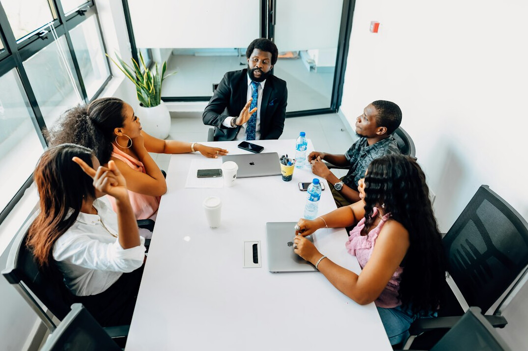woman leading business meeting